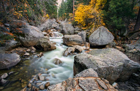 View from the Vernal Bridge on the Mist Trail at Yosemite National Park during the fall foliage...
