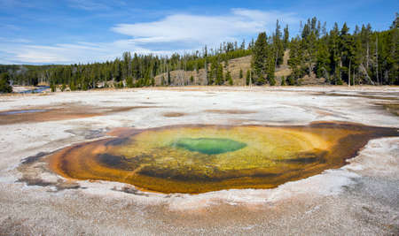 A natural geothermal geyser at Yellowstone National Park in Wyoming. Taken at the Geyser Hill area.の写真素材