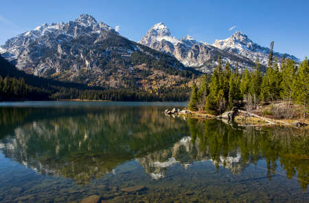 Taggart Lake on a blue sky day in Grand Teton National Park, Wyoming.の写真素材