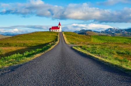 The scenic road leading to IngjaldshÃ³ll church in Iceland.の写真素材