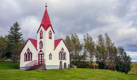 Breidabolstadur church and graveyard, located in Iceland.