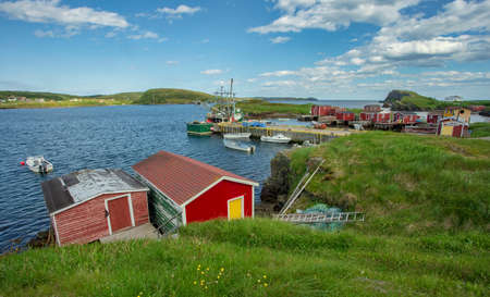 Some colorful fishing shacks along the coast at Port Rexton, Newfoundland.のeditorial素材