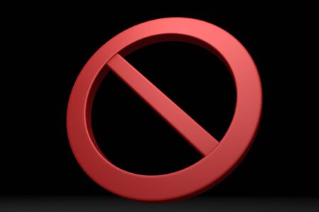 Red prohibition symbol in black backgroundの写真素材