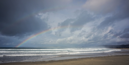 Double rainbows over Morro Bay after storm の写真素材