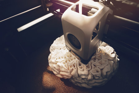 3D printing of a human brain model â top view revealing internal lattice support structures during FDM rapid prototyping for neuroscience and biomedical research.の写真素材
