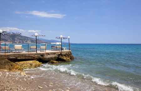 a terrace on the coast with blue skyの写真素材