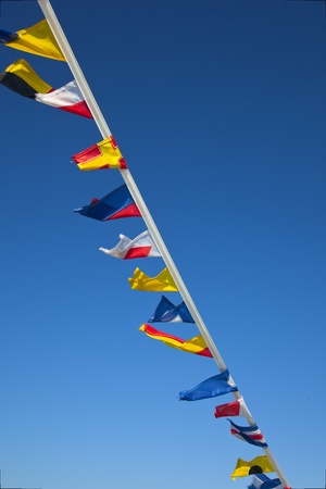 nautial flags with blue sky