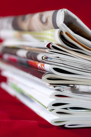 stack of magazines isolated on redのeditorial素材