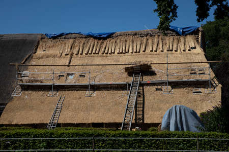 Construction site (roof) from family home with strawの写真素材