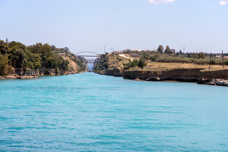 The Corinth Canal connects the Gulf of Corinth with the Saronic Gulf in the Aegean Sea.の写真素材