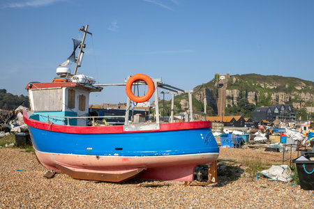 Fish boat on land in Hastingの写真素材