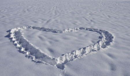 Heart in snowの写真素材