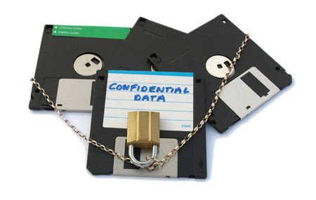 Floppy disks, labelled confidential data, with chain and padlock.の写真素材