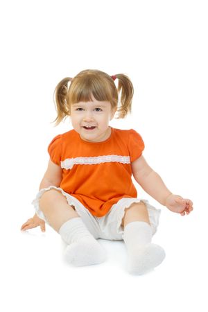Little funny sitting girl isolatedの写真素材
