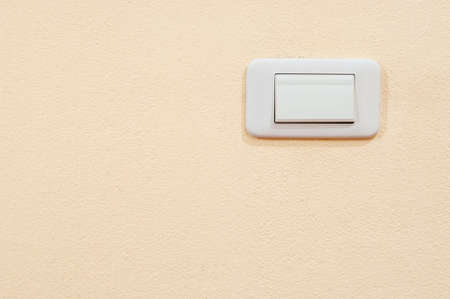 white electric switch on a wallの写真素材