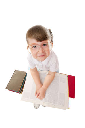 Little girl with books isolatedの写真素材