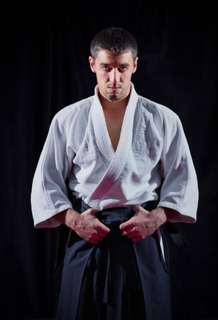 Aikido fighter on black backgroundの写真素材