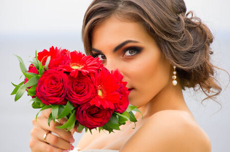 Bride with a bouquet of flowersの写真素材
