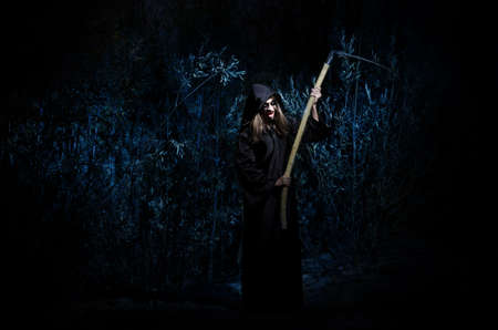 Woman with braid in forestの写真素材