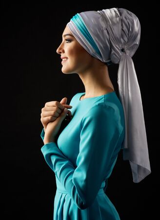 Portrait of muslim woman on blackの写真素材