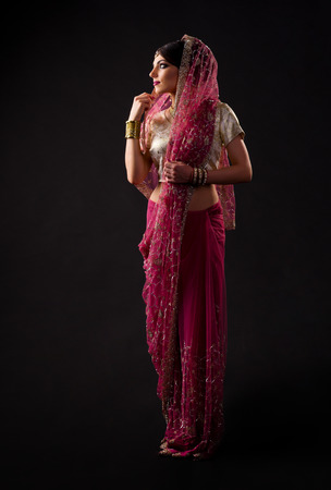 Indian woman on black backgroundの写真素材