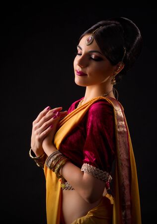 Indian woman on black backgroundの写真素材