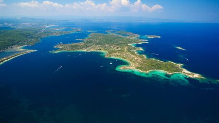 Sea islands under clear blue skyの写真素材