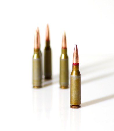 Ammunition cartridges on white background