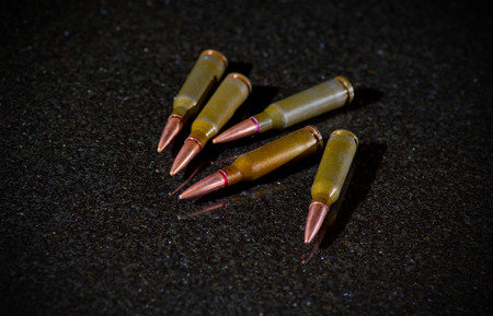 Ammunition cartridges on black background