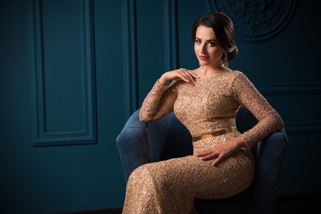 Studio low key portrait of beautiful womanの写真素材