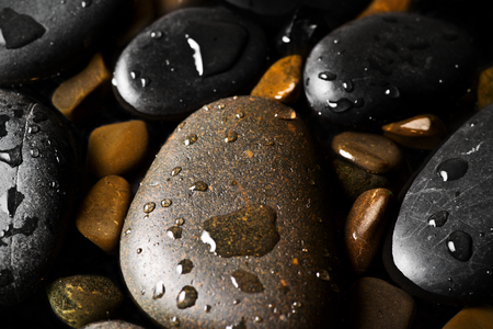 Grey wet pebbles background wallpaperの写真素材