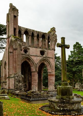 Moody soft light falls on Dryburgh Abbey ruins in the Borders area of Scotland, United Kingdomの写真素材
