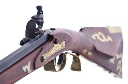 Replica flint lock rifle, close up fiew shoing the inlayed brass and engravings.の写真素材