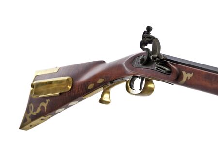 close up view of black powder rifle showing the brass inlays and patch box on the stock.の写真素材