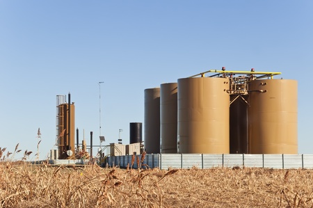 Storage tanks and treater for separating water from crude or condensate from natural gas in central Colorado, USA.の写真素材