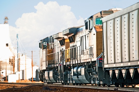 Northbound freight train returning to Wyoming through Colorado, USA with empty coal cars to be reloaded at the mines.の写真素材