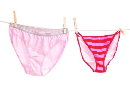 Womens panties hanging on a clothesline outside to dry.の写真素材