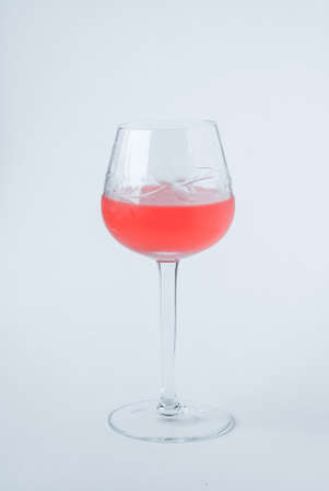 Crystal wineglass with rose wine.の写真素材