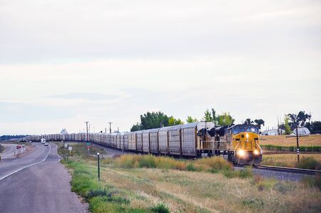 Railroad crossing in central Colorado next to US highway 85の写真素材