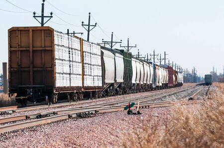 Railroad Cars loaded and waiting to adjoin a west bound train for delivery.の写真素材
