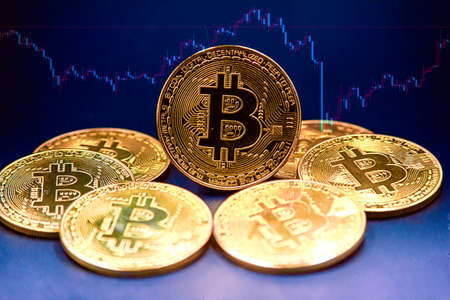 Representation of many colored and illuminated bitcoin coins. Feeling of power and wealth. Cybercurrencies have been found. Investment, price fluctuation.の写真素材