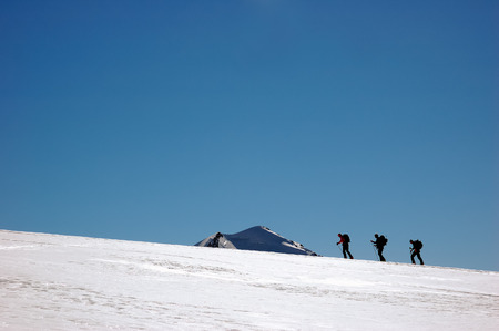 Group of backcountry skiers (ski touring), west alps, Europe.の写真素材