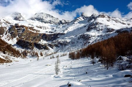 Mountain valley, winter season, west alps, Italy の写真素材