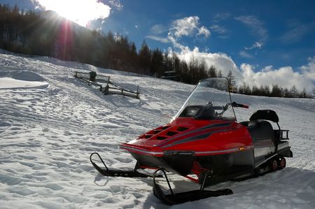 Ski-doo in mountain area, sunny day, alpsの写真素材