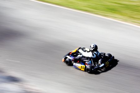 Panning shot of a go-kart racer. Horizontal orientation.の写真素材