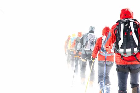 Group of alpine touring skiers on the big Verra Glacier; in background the peaks of Castore and Polluce. MonteRosa, Swiss-Italy border.の写真素材