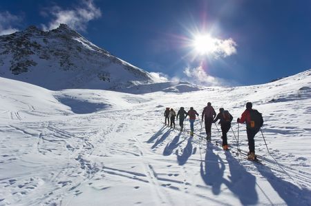 Group of backcountry skiers (ski touring), west alps, Europe.の写真素材