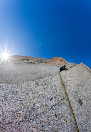 A male climber on a hard vertical pitch. Petit Capucin, Mont Blanc,west Alps, France.の写真素材