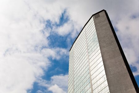 skyscraper over a cloudy sky  Horizontal orientation, Milan, Italy の写真素材