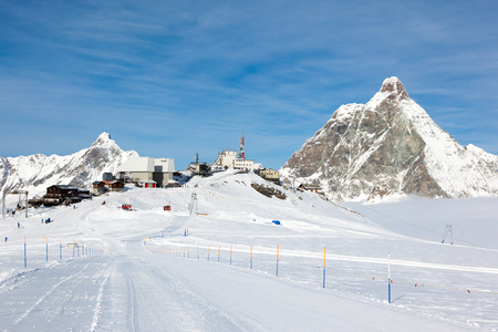 Plateau Rosa in Cervinia ski resort: the highest skiable slope in Italy (3480 mt). In background the Matterhorn. Cervinia, Valle dの写真素材